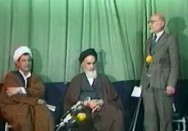قرائت حکم نخست وزیری مهندس بازرگان توسط حجت الاسلام هاشمی و ترجمه دکتر یزدی